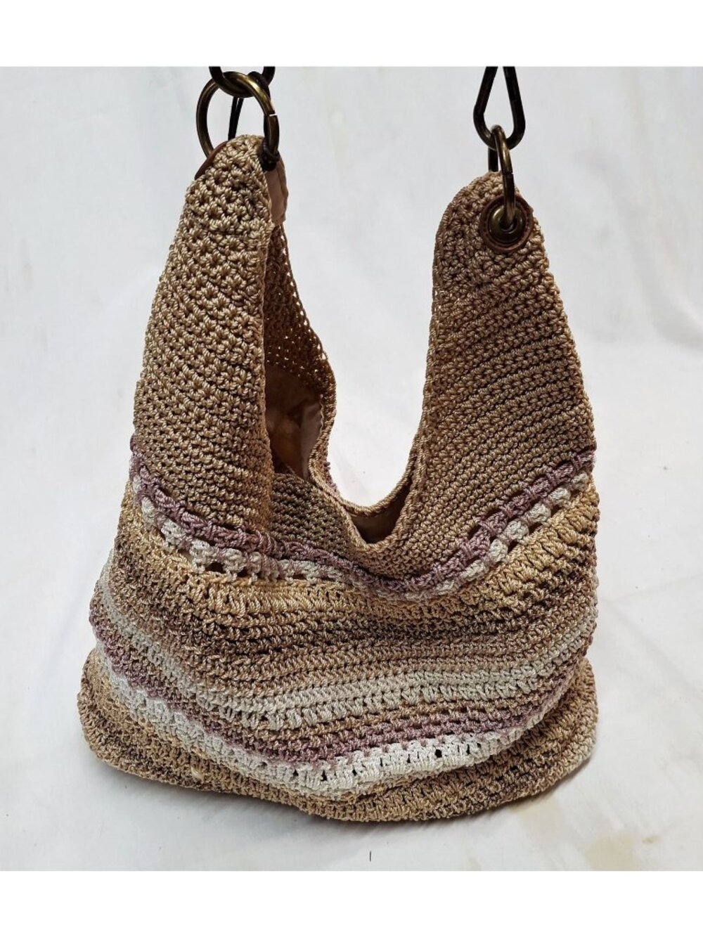This is a The Sak "Janet" Striped Hobo Bag & Feather Charm Beige & Purple Tones